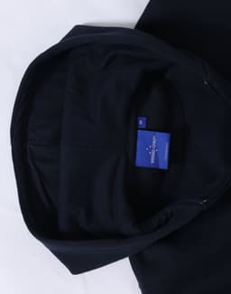 A navy full-zip fleecy hoodie featuring a hood and a branded label inside.