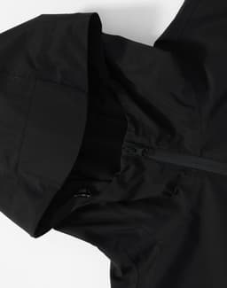 A black unisex waterproof jacket featuring a hood and zip closure, with a logo on the fabric.