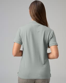 A ladies cotton stretch polo shirt in a muted green colour, featuring a collar and short sleeves.
