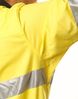 A yellow cotton drill shirt with 3M reflective tape details, featuring a logo on the fabric.