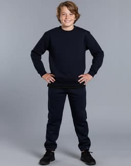 A kids' crew neck fleecy sweater in navy, worn with matching navy pants, featuring a logo on the garment.
