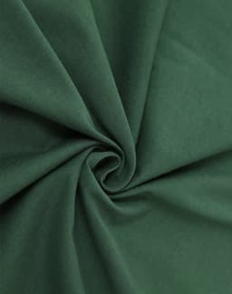 A close-up of dark green cotton fabric featuring a smooth, soft texture. The fabric is gently folded in a spiral.