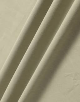 A close-up of soft, folded fabric in a muted green shade. The material has a smooth texture.