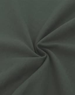 A close-up of a dark green, heavy cotton fabric displaying a smooth texture and subtle sheen.