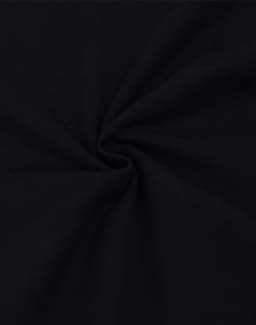 A dark black oversized tee made from heavy cotton, featuring a smooth, twisted fabric texture.