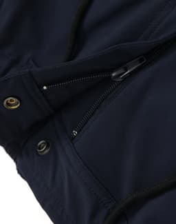 Navy blue water-repellent work pants featuring zippers and pockets, with a logo present on the fabric.