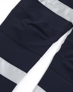 DWR water-repellent flexi work pants in navy with reflective tape accents. Features multiple pockets and a logo.