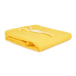 A folded yellow laundry bag made of 100% polyester, featuring a drawstring closure and a small logo.