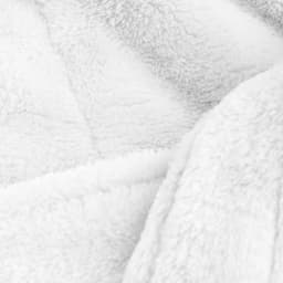A luxurious, soft white microfibre robe, featuring a plush texture and warm appearance.