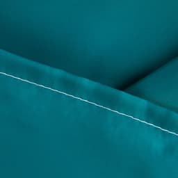 A green fabric slide sheet with smooth texture and contrasting white stitching. It features a logo.