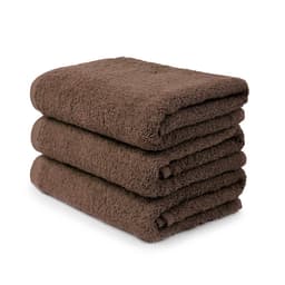 A stack of three dark brown, plush hand towels neatly folded, showcasing their soft texture.