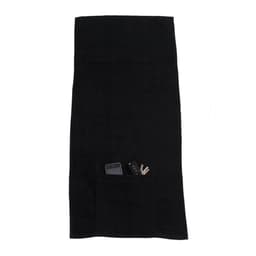 A black sports towel with a pocket, containing a phone and keys. It has a branding logo.