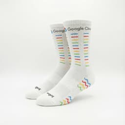 Custom branded cycling socks in white with multicoloured stripes and a branded logo on the side.