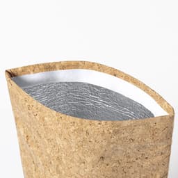 A brown insulated bag with a grey interior, featuring a smooth, rounded edge and a textured surface.