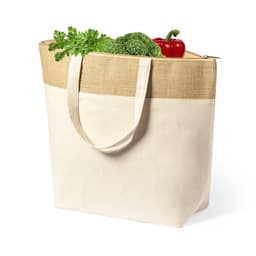 A cream insulated bag with brown accents, filled with fresh vegetables including coriander, broccoli, and a red pepper.