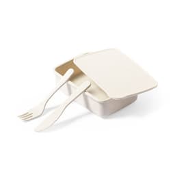 A cream-coloured lunch box with a lid, accompanied by a fork and knife, featuring a simple design and branding.