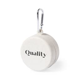 A foldable cup in a cream colour with a carabiner attachment. Features branding on the front.