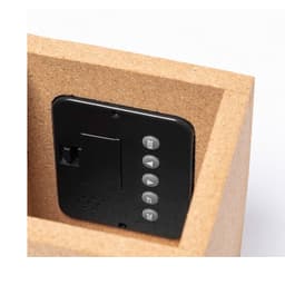 A multifunction pencil holder in a cork finish, featuring a black control panel with buttons.