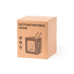 A brown cardboard box containing a multifunction pencil holder with a digital display for time, alarm, and temperature.
