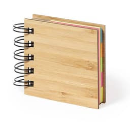 A bamboo notebook featuring a spiral binding and multiple coloured sticky note sections inside.