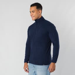 A navy blue polar fleece jacket with a high collar and a zip, worn by a smiling man. It features a logo.