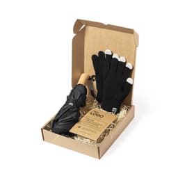 A gift box containing a black umbrella and black gloves with white tips, presented in a cardboard packaging.