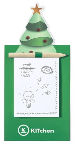 A green Christmas tree magnet with a notepad and pencil attached, featuring a festive design and a star topper.