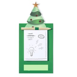 A green Christmas tree-shaped magnetic note holder with a notepad and pencil attached.