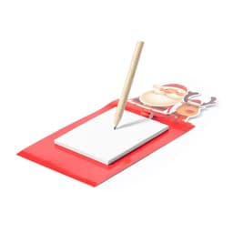 A red magnetic to-do list featuring a Santa and reindeer design, with a wooden pencil on a blank notepad.