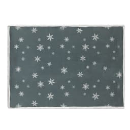 A soft blanket in dark grey adorned with white snowflake patterns and a contrasting edge. It features a logo.