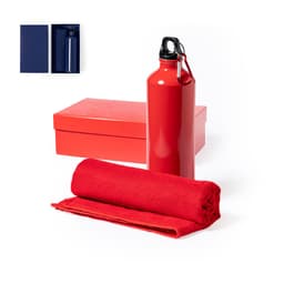 A red drink bottle with a black cap and a red towel, presented in a red gift box. The image includes a blue box in the corner.