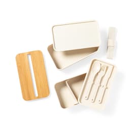 A beige lunch box with a bamboo lid, a spoon, fork, and knife, all arranged neatly.