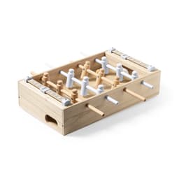 A wooden tabletop foosball game featuring white and natural wood players and rods. It includes a scoring system on the side.