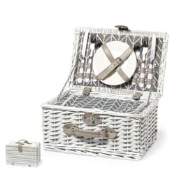 A white wicker picnic basket with a patterned interior, containing plates and utensils, plus a small matching container.