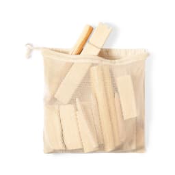 A mesh storage bag containing wooden blocks and two larger wooden pieces, all in natural wood colour.