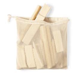 A mesh bag filled with wooden blocks and sticks in a natural colour. The bag has a drawstring closure.