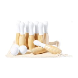A set of wooden bowling pins with white tops, accompanied by two white balls, arranged on a neutral cloth.