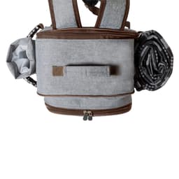 A grey cooler backpack with brown accents, featuring a handle and rolled blanket attached on the side.
