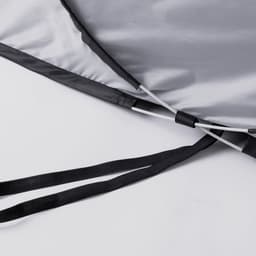 A grey tent with black straps and poles, featuring a simple construction design and a logo.
