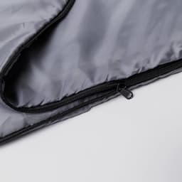 A grey bag with a zippered opening, showcasing a smooth, shiny interior lining. Features a branding logo.