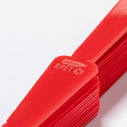 A red handheld fan with a textured handle and a logo, made from durable materials.