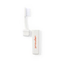 A toothbrush and its case in a light colour, featuring a logo. The toothbrush has a compact design with soft bristles.
