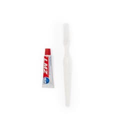 A dental kit featuring a tube of toothpaste and a toothbrush, both in assorted colours. The kit has a logo.