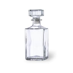 A clear glass whisky decanter with an octagonal shape and a flat top. It has a minimalist design and a sealed stopper.