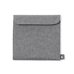 A grey lunch bag with a flap closure and a small logo tag at the bottom.