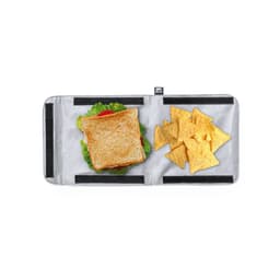 A grey lunch bag with a sandwich topped with lettuce and tomato, accompanied by tortilla chips on one side. It has a logo.