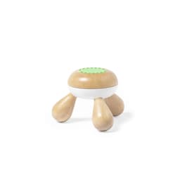 A wooden massager with three rounded legs and a green dotted pattern on top. It features a mix of natural wood and white finishes.