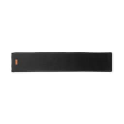 A long black scarf featuring a small logo on one end, designed for fashion and warmth.