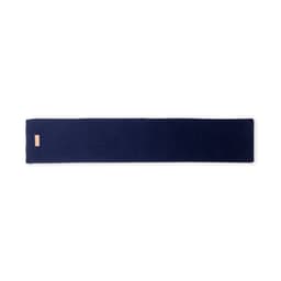 A navy blue scarf with a branded tag, featuring a simple and sleek design.