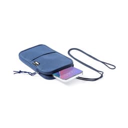 A navy blue Landry Bag with a zippered pocket, featuring a strap and a phone partially visible inside.